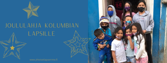 Ryhmä kolumbialaisia lapsia, joilla on maskit kasvoilla kuvan oikealla puolella. Vasemmalla teksti: Joululahja Kolumbian lapsille.